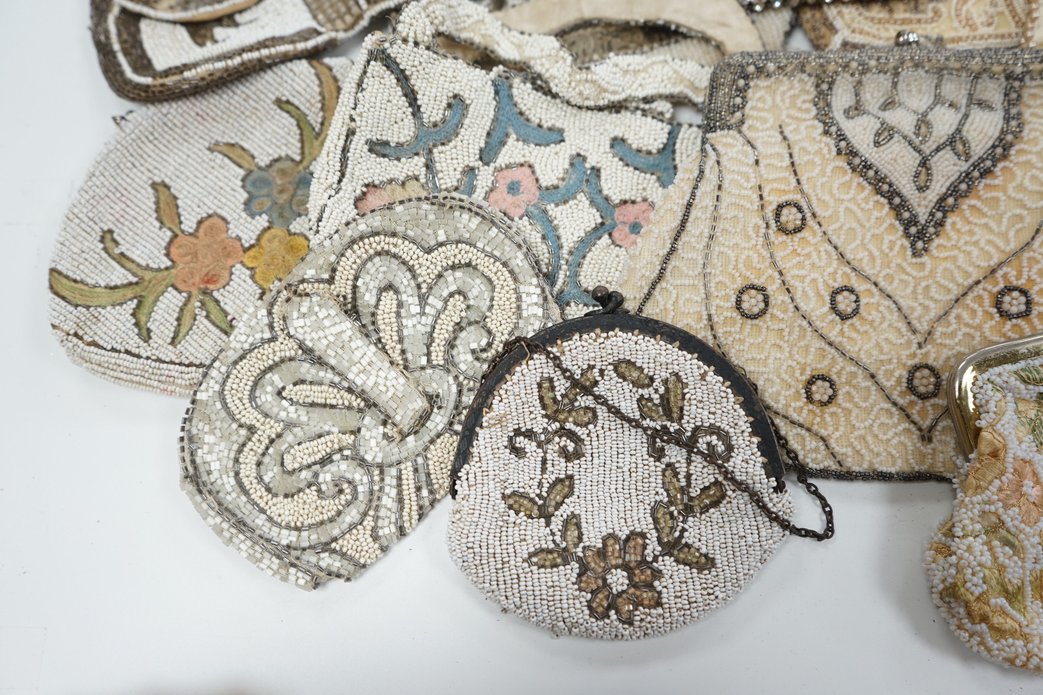 Twelve 1930’s beaded, sequin and pearl evening clutch bags and bags, some with embroidered decoration
